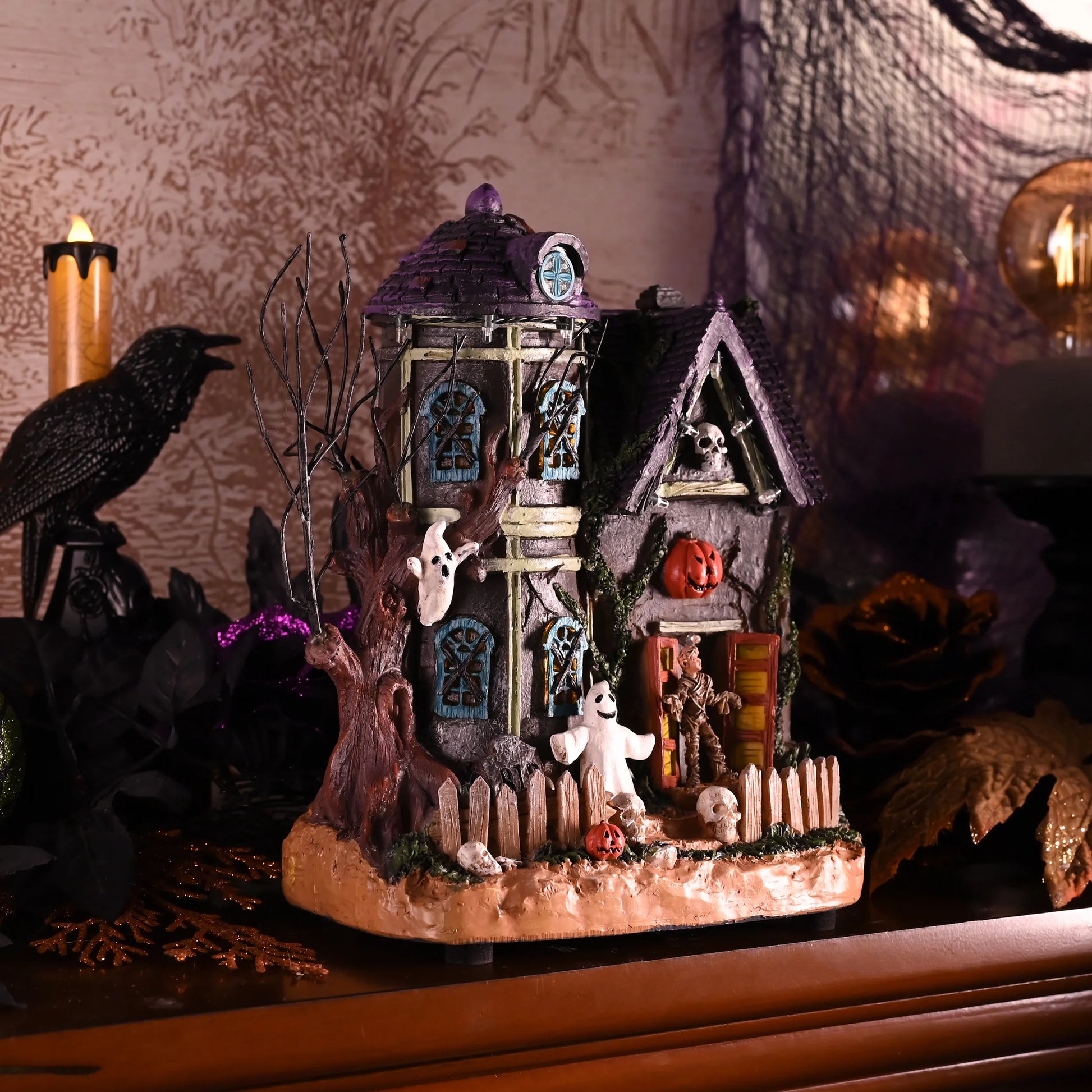 10.24 Inches Musical Halloween Village Colorful Lighted Halloween House with Mummies Ghosts & Haunted Tree for Indoor Fireplace Hallways