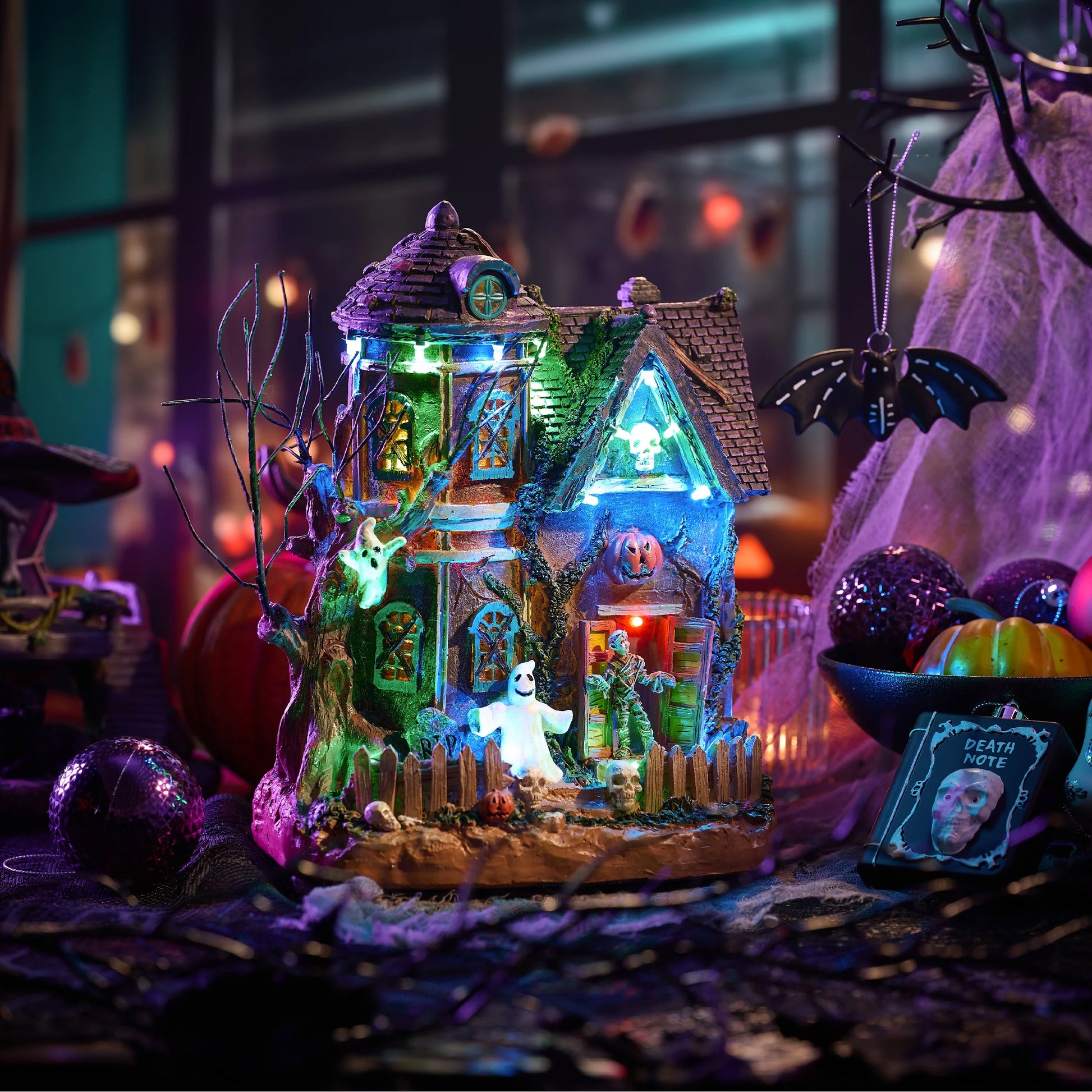 10.24 Inches Musical Halloween Village Colorful Lighted Halloween House with Mummies Ghosts & Haunted Tree for Indoor Fireplace Hallways